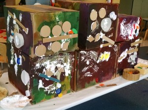 kids art project with lots of glue and cardboard